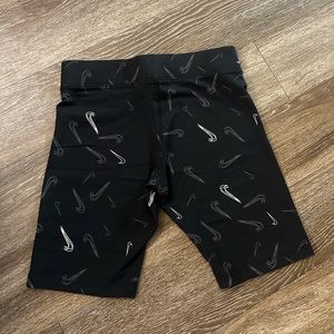 Nike Black Bike Shorts with White Swoosh Pattern